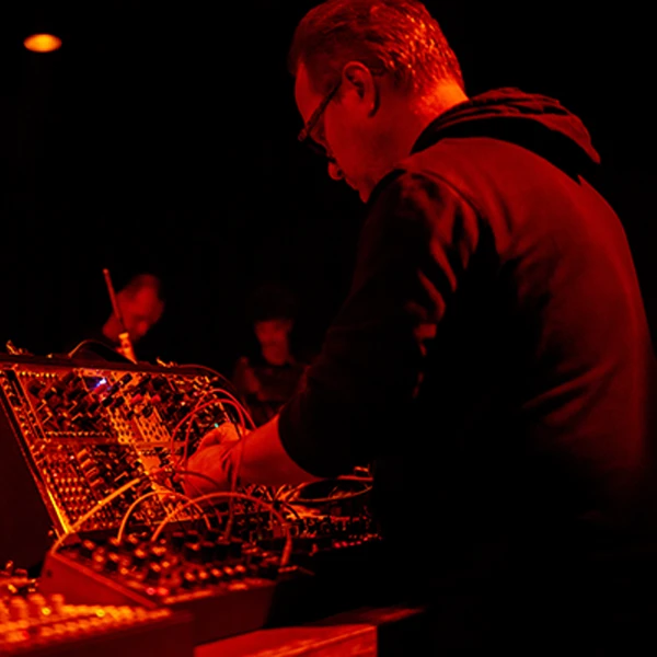 the artist Insect O. performing on modular synthesizers